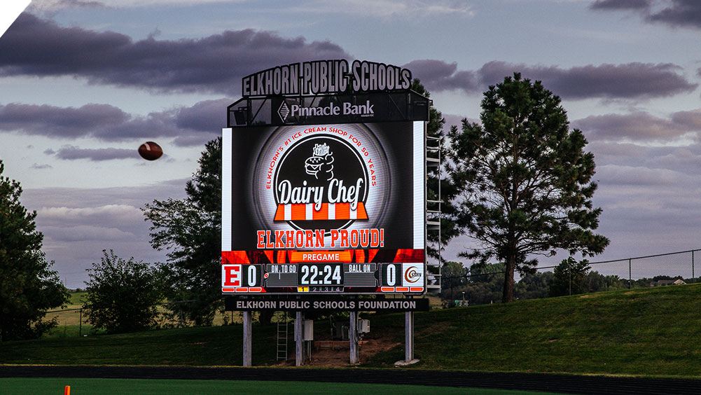 oW3426 Football LED Video Scoreboard at Elkhorn High School Stadium with Sponsor Ad