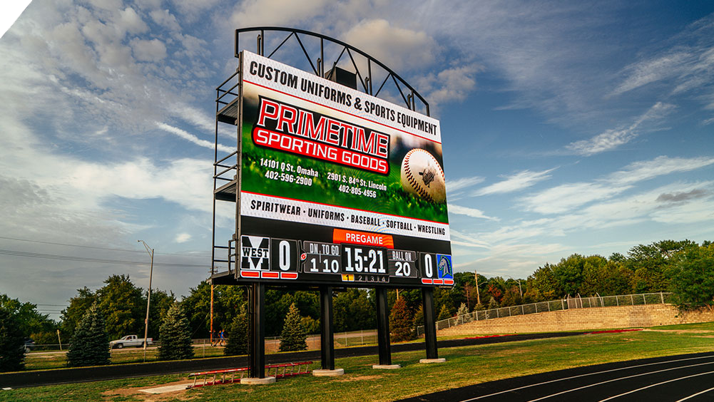 oW3426 Football LED Video Scoreboard at Millard High School Stadium with Sponsor Ad