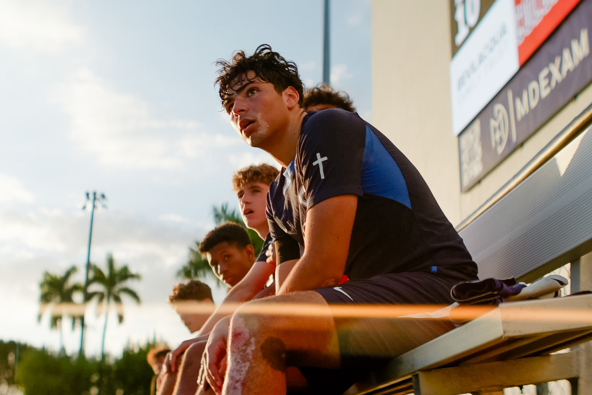 The Explorers stay locked in from the sideline as the action unfolds.