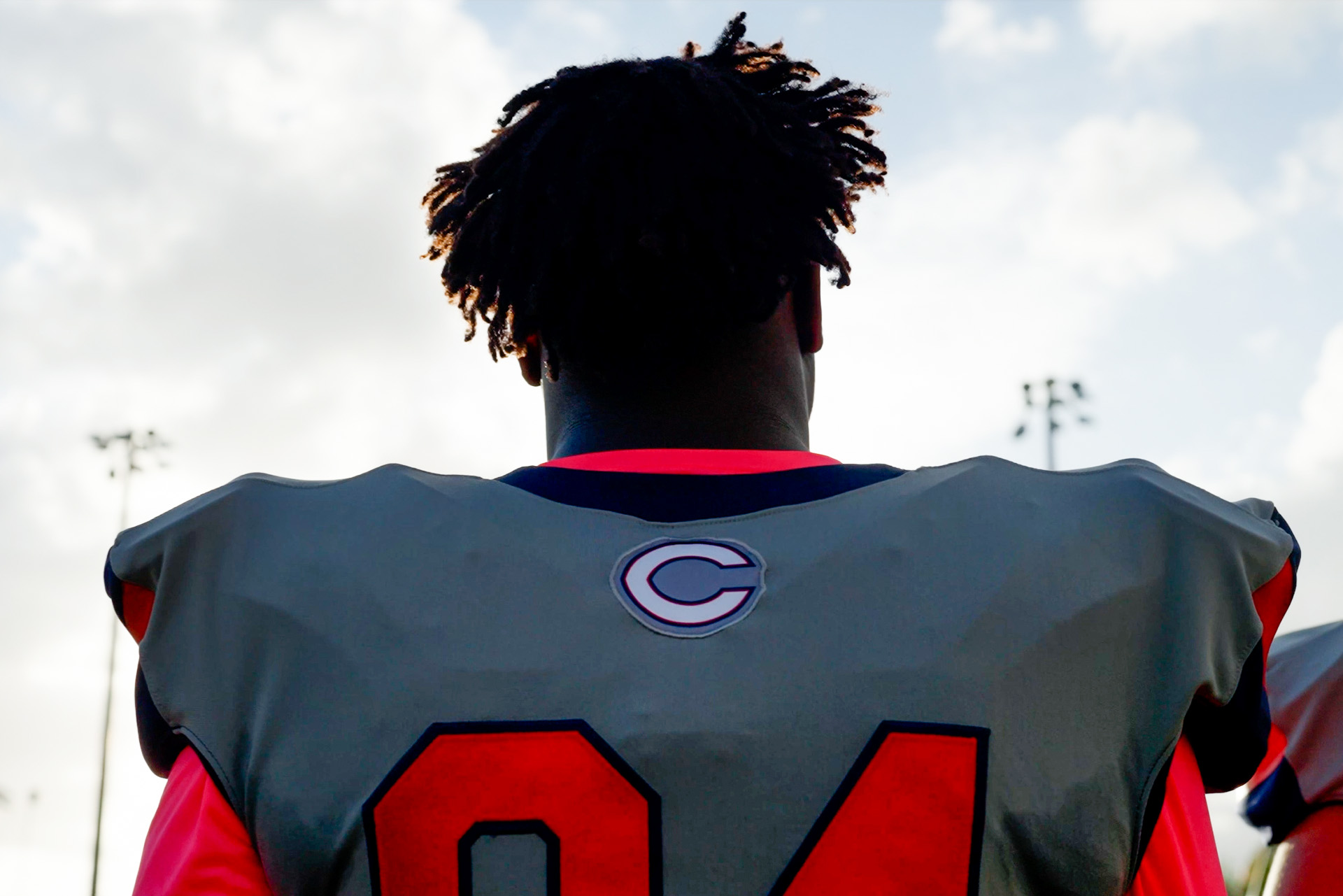 Ready for kickoff—an Explorers football player takes in the field before the action begins.