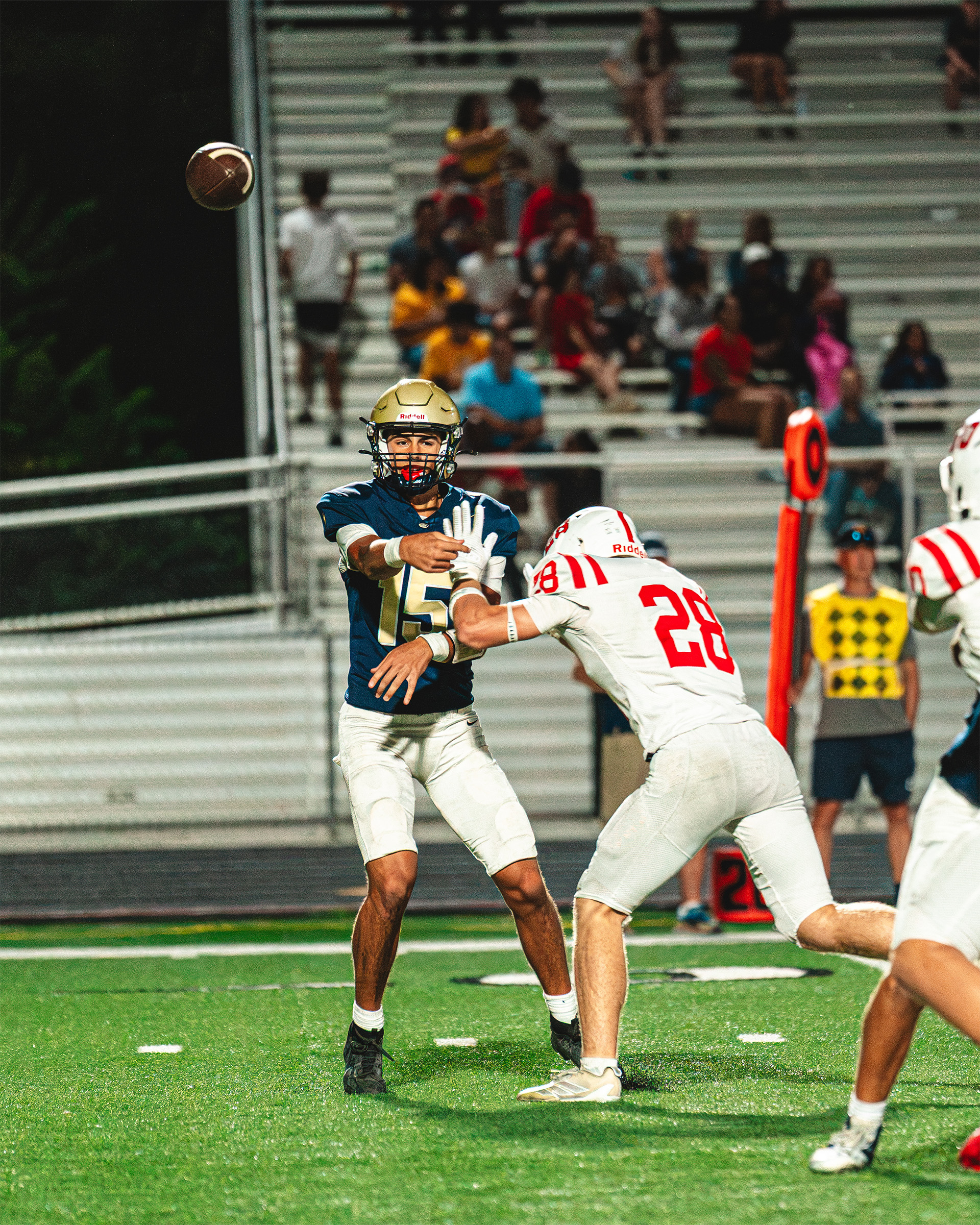 Elkhorn South battles at the line under the Friday night lights.