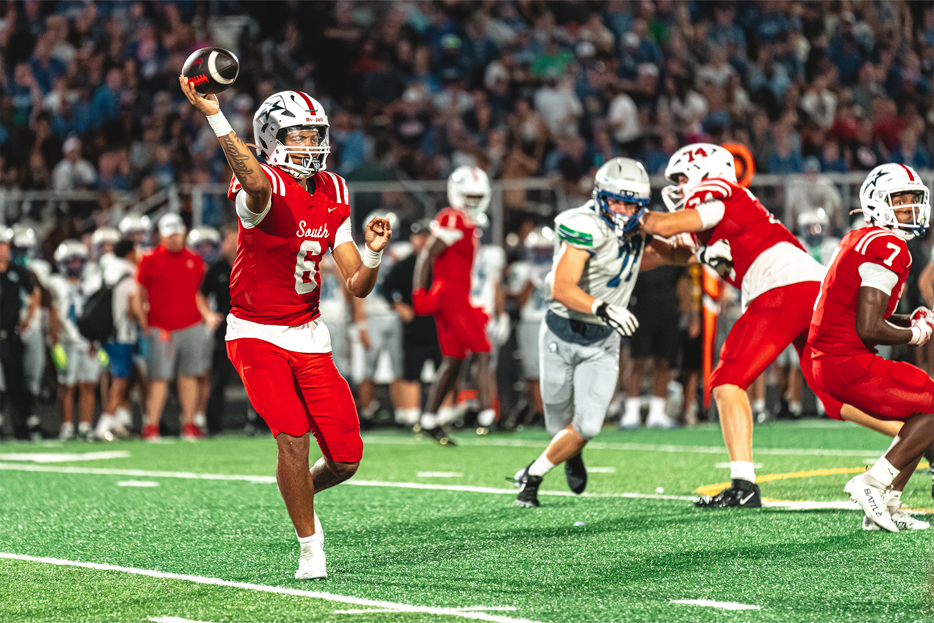 The Millard South quarterback releases the ball as the pocket takes shape.