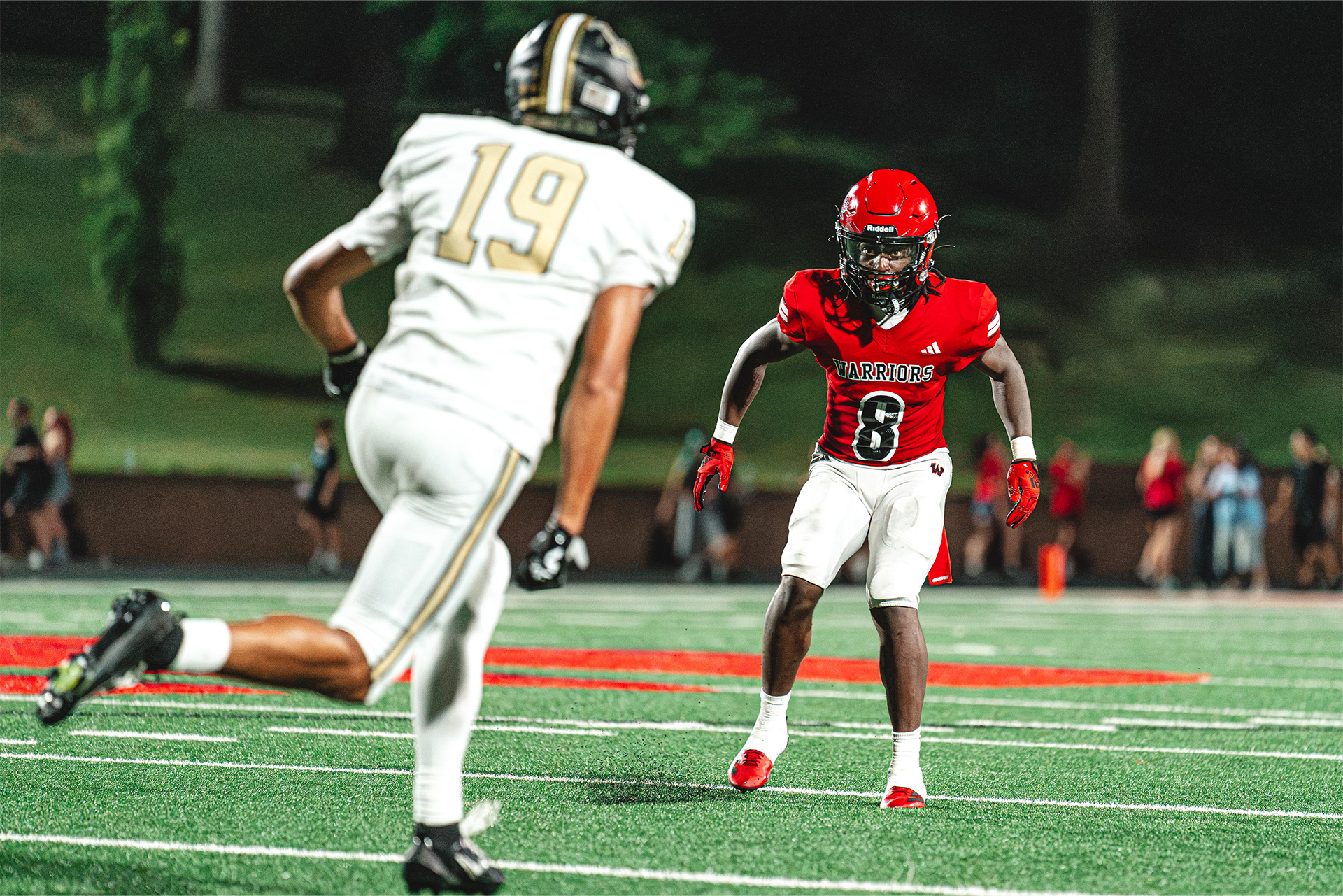 A Westside defender reads the play and prepares to make his move.